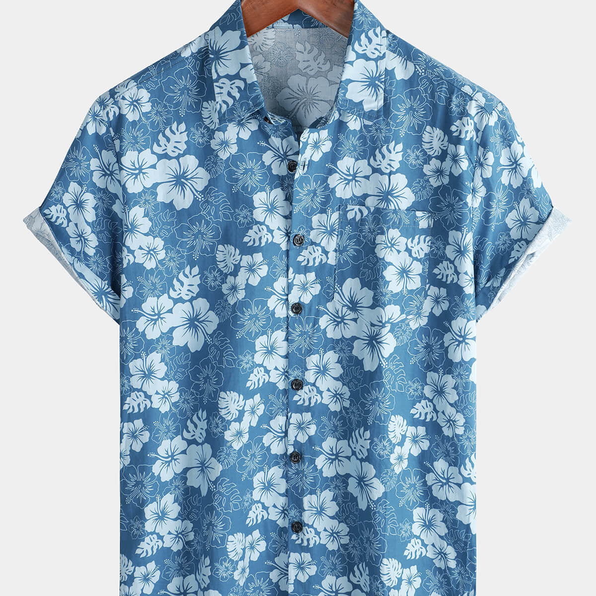 Camisa de manga corta con bolsillo y estampado floral hawaiano azul para hombre