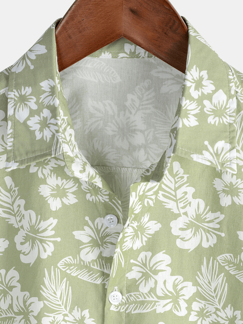 Camisa de manga corta con botones y estampado floral de algodón verde hawaiano para hombre