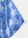 Camisa playera de algodón con estampado floral tropical de manga corta para hombre