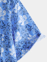 Camisa playera de algodón con estampado floral tropical de manga corta para hombre