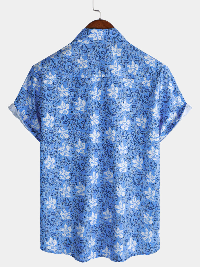 Camisa playera de algodón con estampado floral tropical de manga corta para hombre