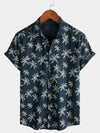 Camisa hawaiana de manga corta con botones y estampado de palmeras de algodón azul marino para hombre