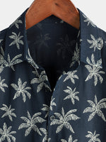 Camisa hawaiana de manga corta con botones y estampado de palmeras de algodón azul marino para hombre