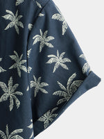 Camisa hawaiana de manga corta con botones y estampado de palmeras de algodón azul marino para hombre