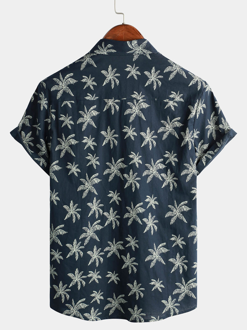 Camisa hawaiana de manga corta con botones y estampado de palmeras de algodón azul marino para hombre