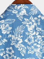 Camisa Aloha de manga corta para hombres de algodón con estampado tropical de hojas y flores azules