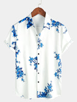 Camisa casual de manga corta para hombres con estampado floral azul