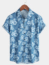 Camisa de manga corta con bolsillo y estampado floral hawaiano azul para hombre