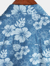 Camisa de manga corta con bolsillo y estampado floral hawaiano azul para hombre