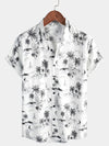 Camisa hawaiana de manga corta blanca con estampado de palmeras y piña tropical para hombre