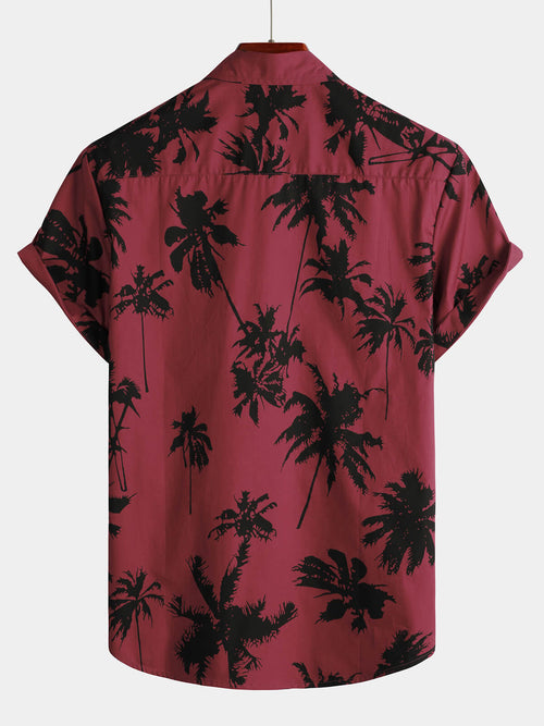 Camisa de playa de manga corta con cuello en algodón color burdeos con estampado de palmeras para hombre