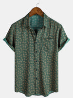 Camisa de manga corta con bolsillo verde y estampado geométrico retro para hombre