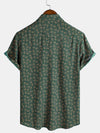 Camisa de manga corta con bolsillo verde y estampado geométrico retro para hombre