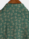 Camisa de manga corta con bolsillo verde y estampado geométrico retro para hombre