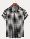 Camisa de manga corta de algodón con bolsillo y estampado de cuadros negros para hombre