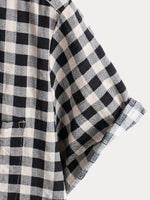 Camisa de manga corta de algodón con bolsillo y estampado de cuadros negros para hombre