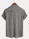 Camisa de manga corta de algodón con bolsillo y estampado de cuadros negros para hombre