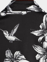 Camisa hawaiana de hombre de manga corta con botones y estampado de calaveras y colibríes en negro estilo punk rock