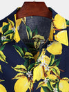 Camisa de hombre hawaiana de manga corta con estampado de limones amarillos tropicales