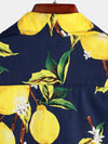 Camisa de hombre hawaiana de manga corta con estampado de limones amarillos tropicales