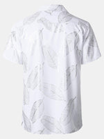 Camisa de manga corta con cuello cubano y hojas tropicales para hombre