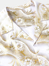 Camisa de manga corta con cuello cubano y estampado floral dorado para hombre