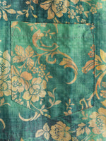 Camisa de manga corta con bolsillo y estampado floral verde para hombre