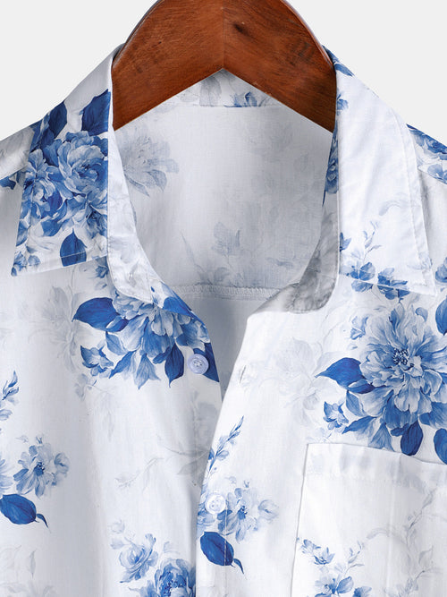 Camisa hawaiana de manga corta con estampado floral azul festivo para hombre