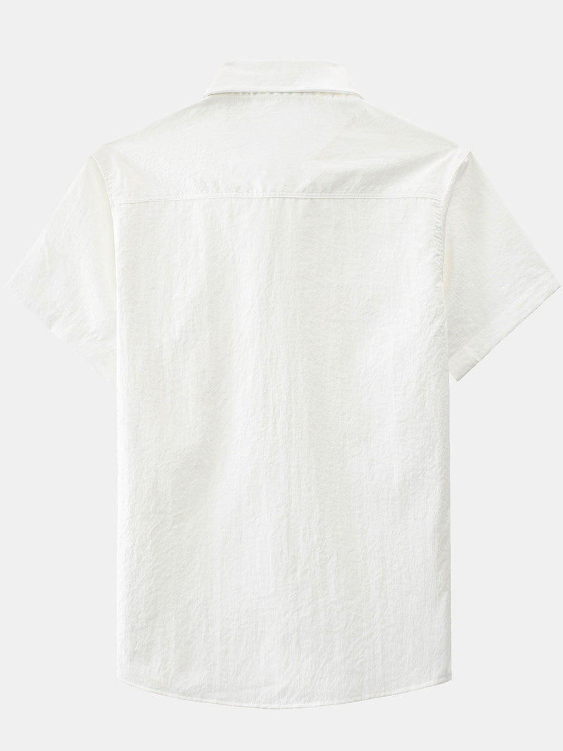 Camisa informal con botones y bolsillo liso para hombre
