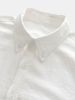 Camisa informal con botones y bolsillo liso para hombre