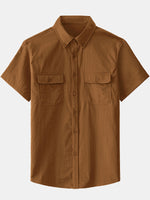 Camisa informal con botones y bolsillo liso para hombre
