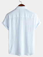 Camisa informal de manga corta con bolsillo de color liso de verano para hombre