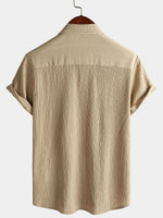 Camisa informal de manga corta con bolsillo de color liso de verano para hombre