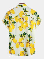 Camisa de hombre hawaiana de manga corta con estampado de limones amarillos tropicales