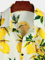 Camisa de hombre hawaiana de manga corta con estampado de limones amarillos tropicales