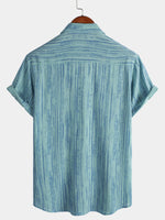 Camisa de manga corta transpirable con bolsillo y rayas negras para hombre